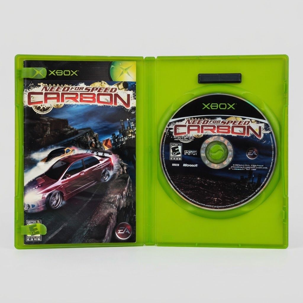 Open green case showing the Need for Speed Carbon Xbox disc and instruction manual inside