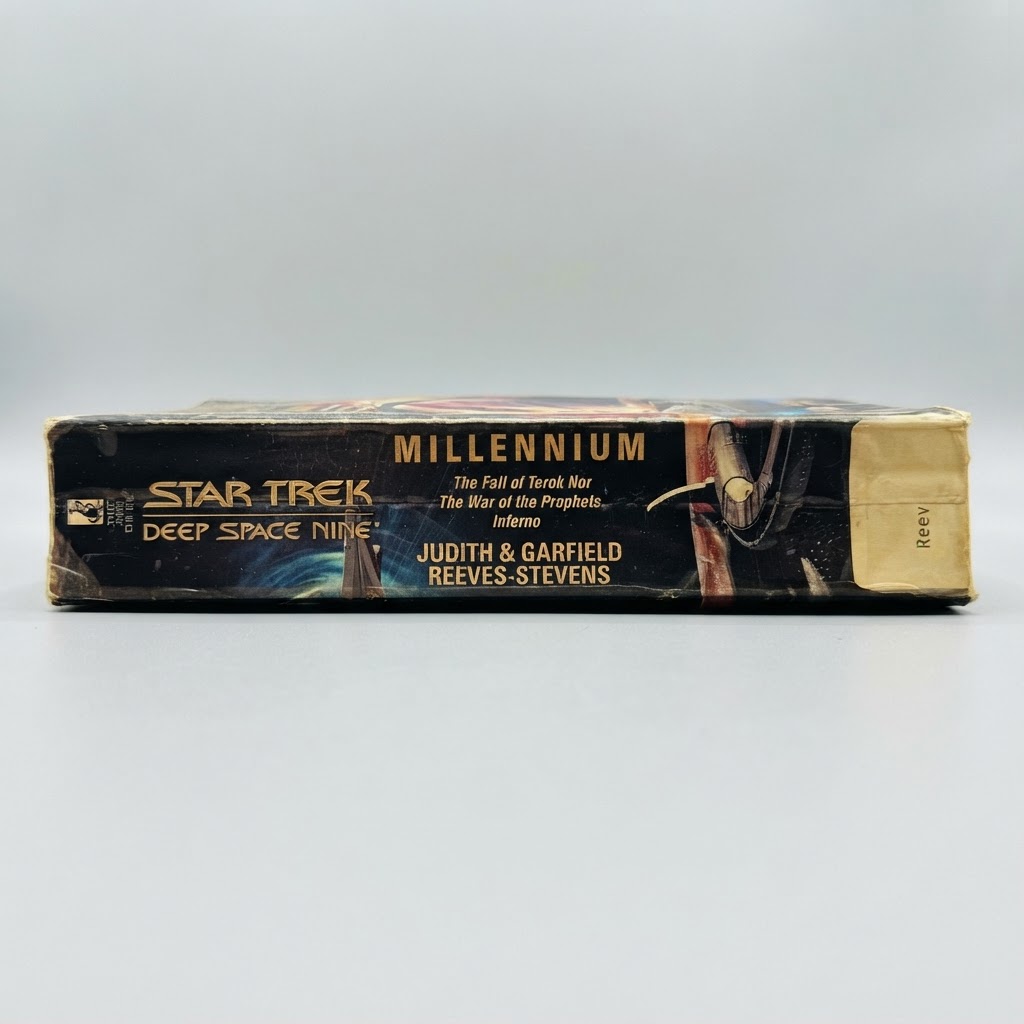 Spine view of the Star Trek: Deep Space Nine Millennium vintage paperback showing some edge wear and yellowing