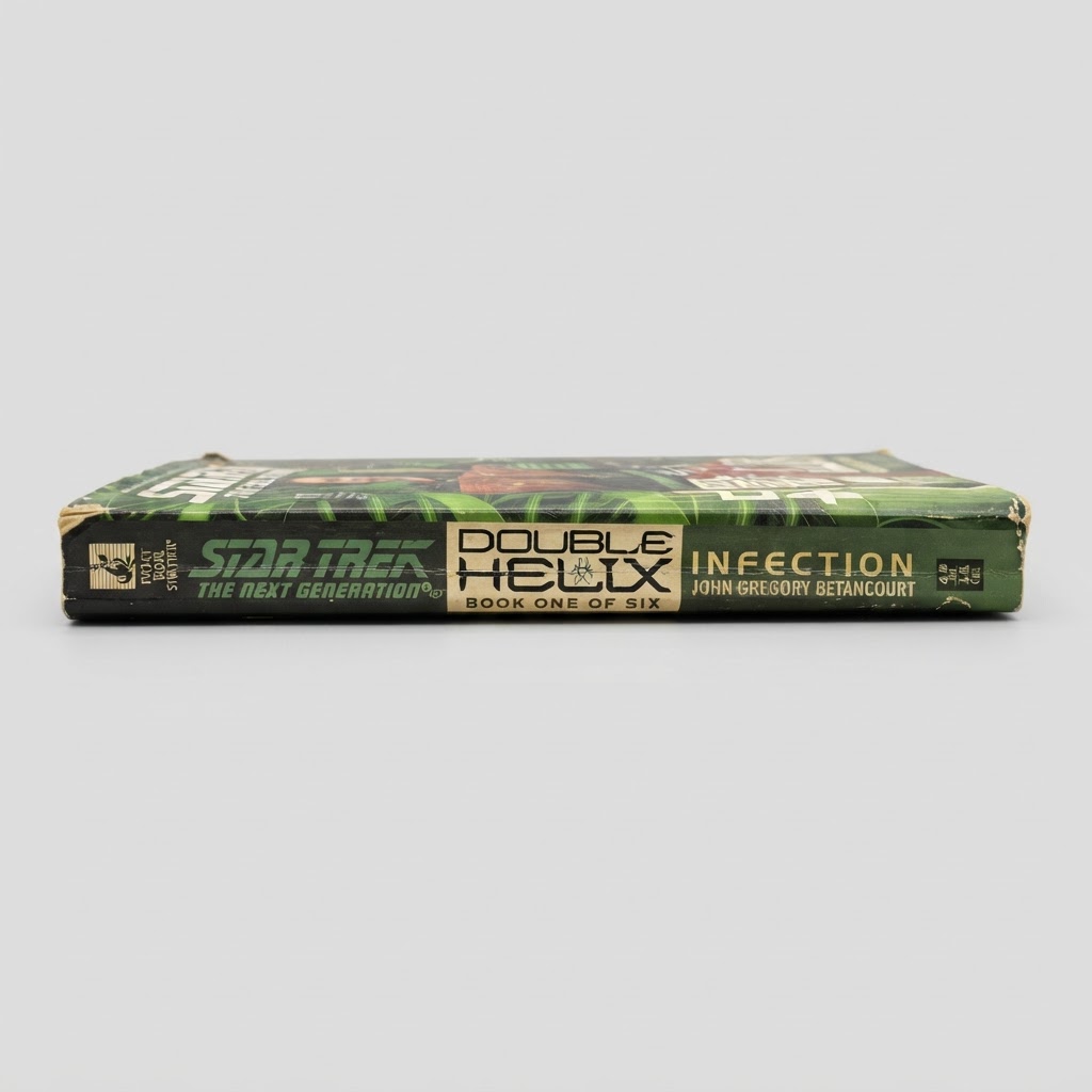 Green spine of the Star Trek: TNG Double Helix: Infection vintage paperback book showing minor edge wear