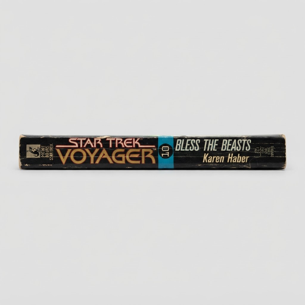 Black spine of the Star Trek: Voyager Bless the Beasts vintage paperback with wear along the edges