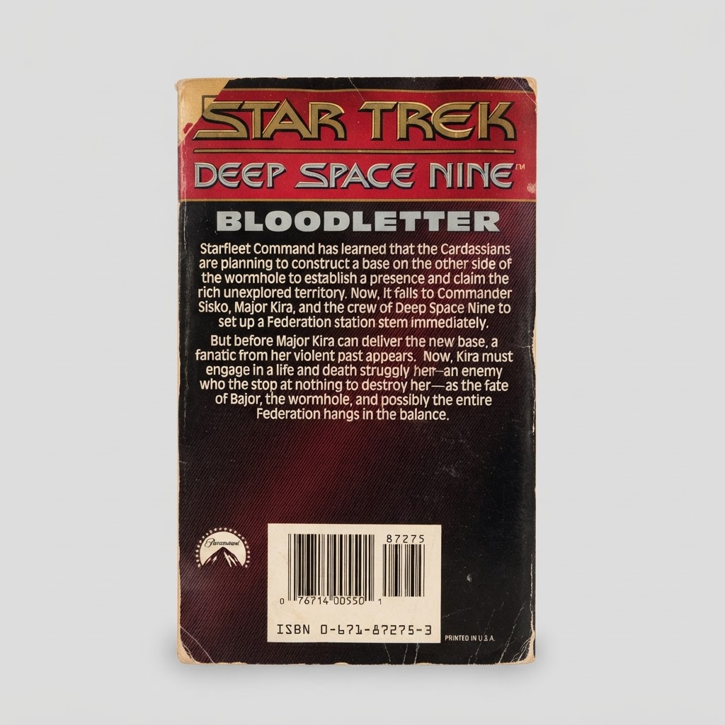 The back cover of the vintage Star Trek: Deep Space Nine "Bloodletter" paperback with gold title text and a synopsis