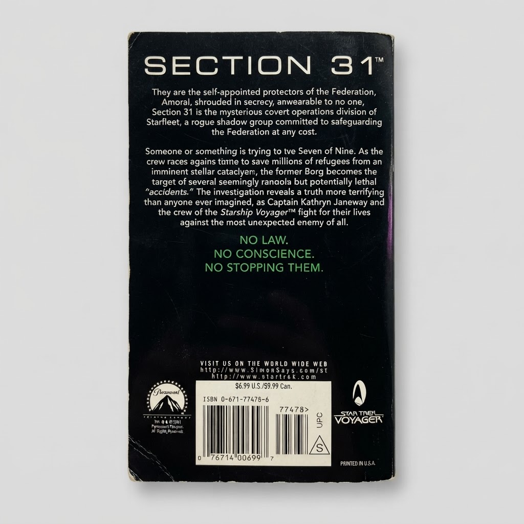 Back cover of the Star Trek: Voyager Section 31: Shadow vintage paperback with black background and white text