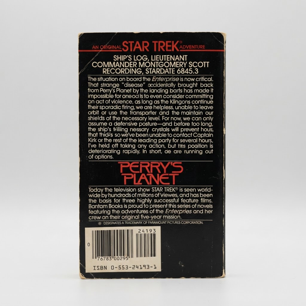 Back cover of the Star Trek Perry's Planet vintage paperback featuring white text on a black background with a barcode