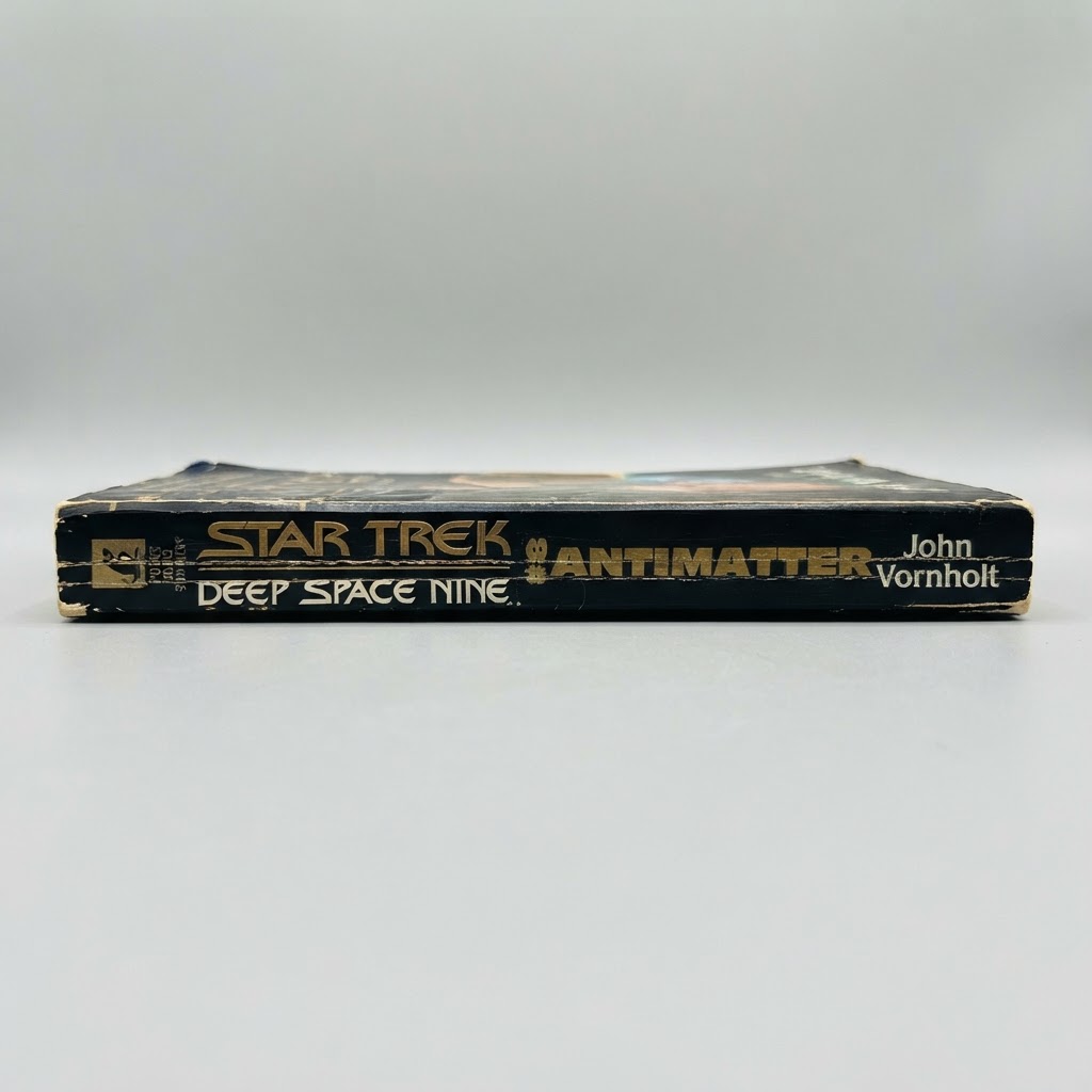 Black spine of the Star Trek: Deep Space Nine Antimatter vintage paperback with visible edge wear