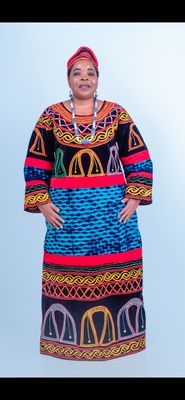 Sample multi coloured African female traditional long gown