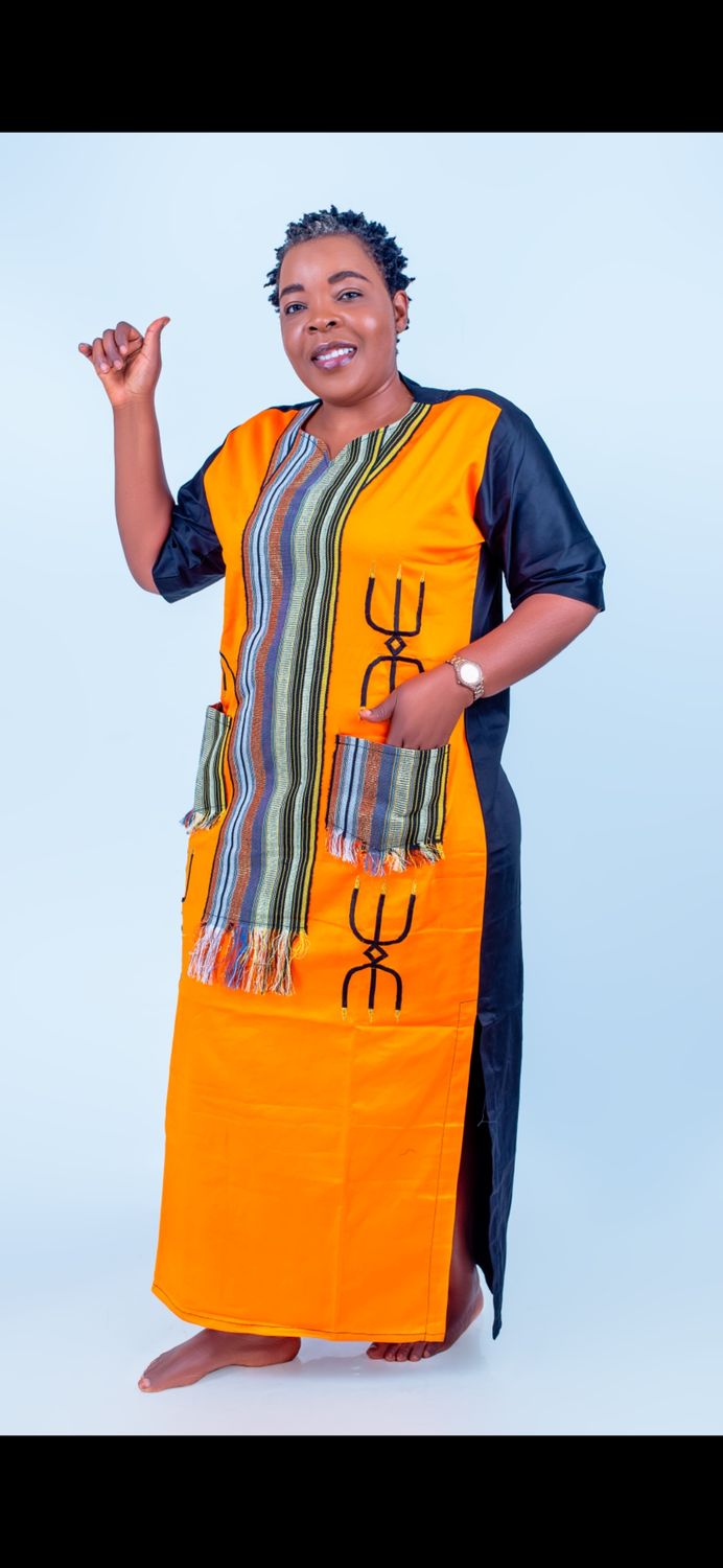 Sample Yello and black African female long gown