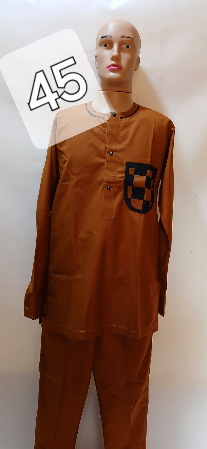 Sample two piece trouser and top, brown African male Senators wear