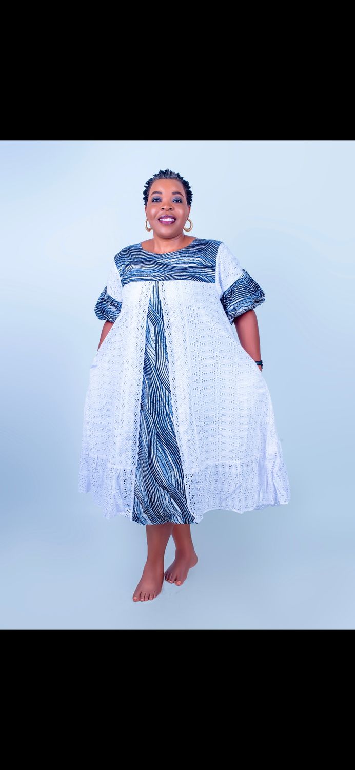 Sample female African white gown