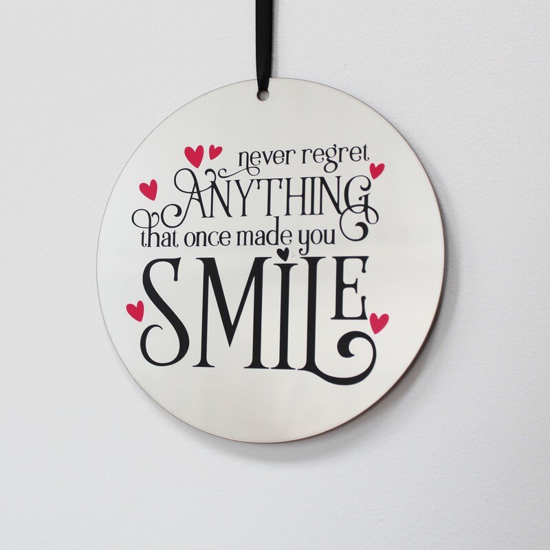 never regret ANYTHING that once made you SMILE