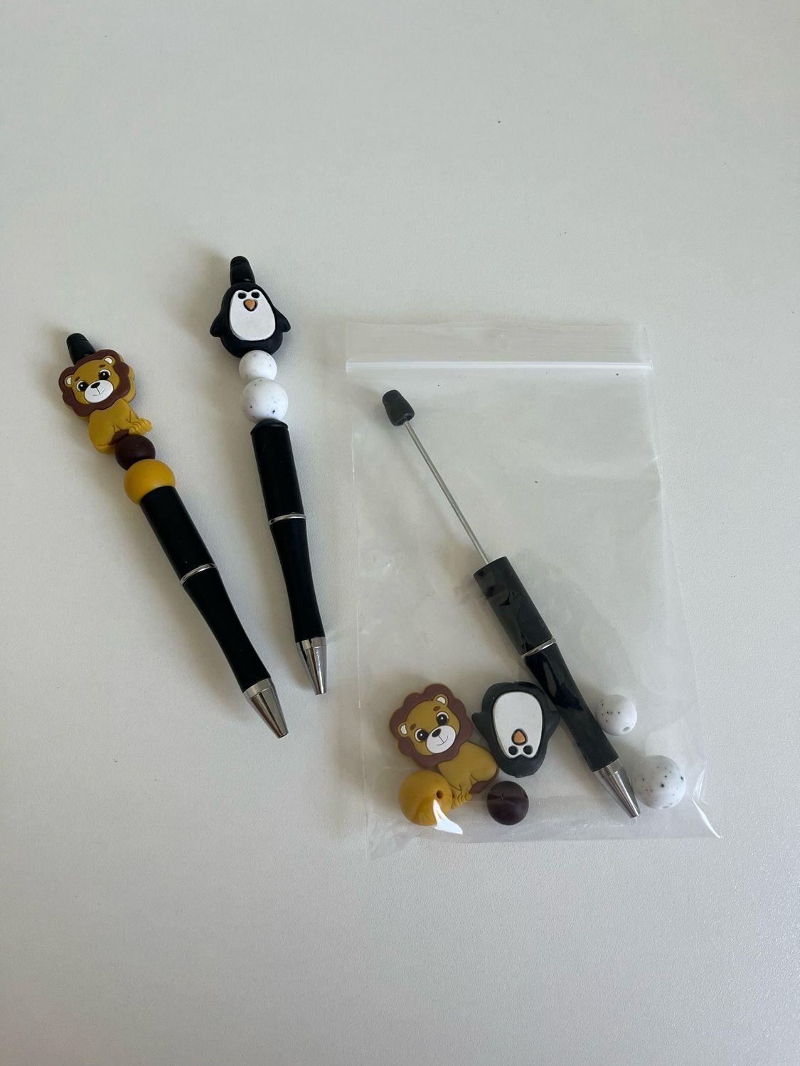 DIY maak zelf je pen pinguïn/leeuw