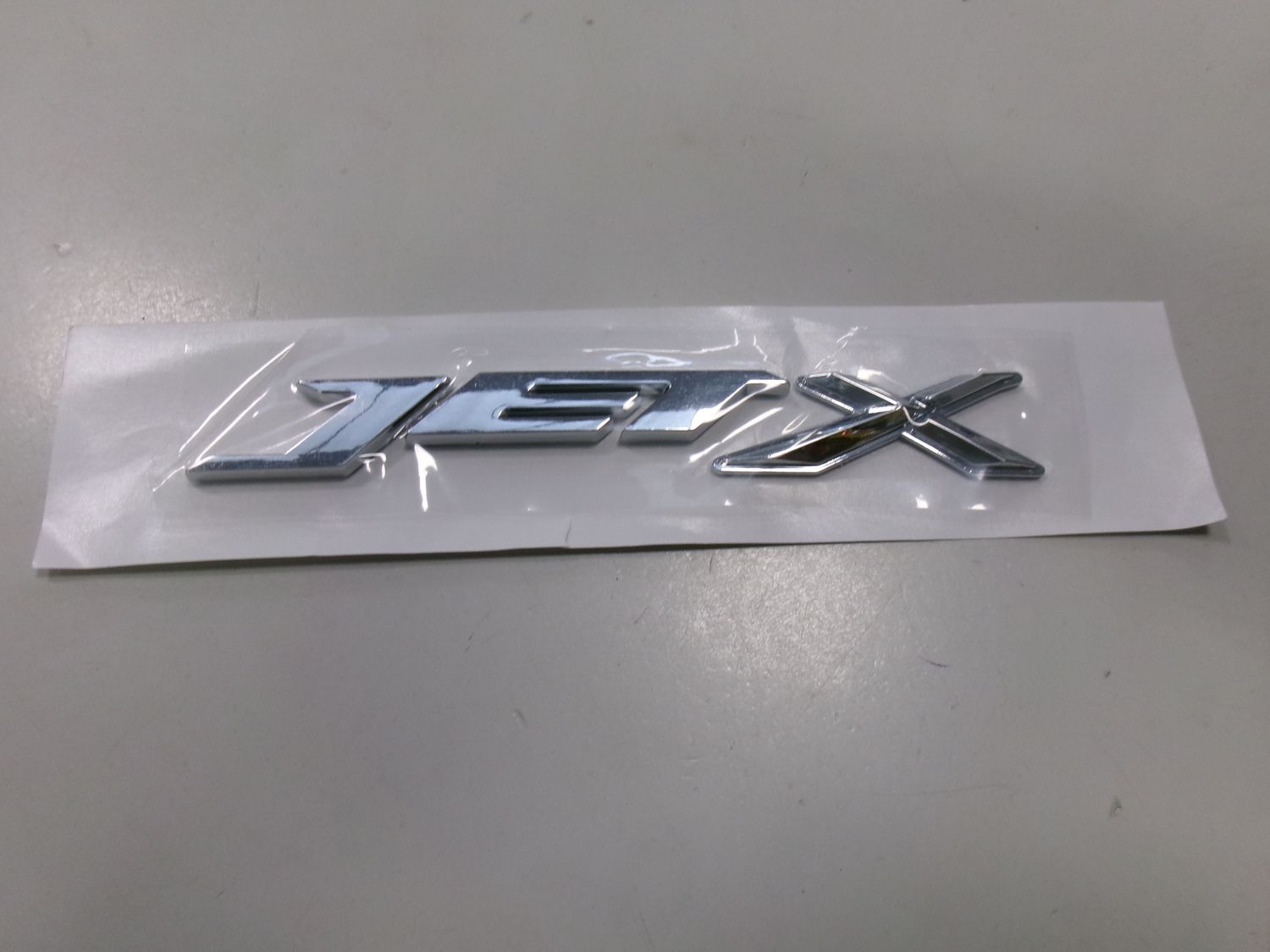 87128XN1000 TARGHETTA SYM JET X 125 EURO 5