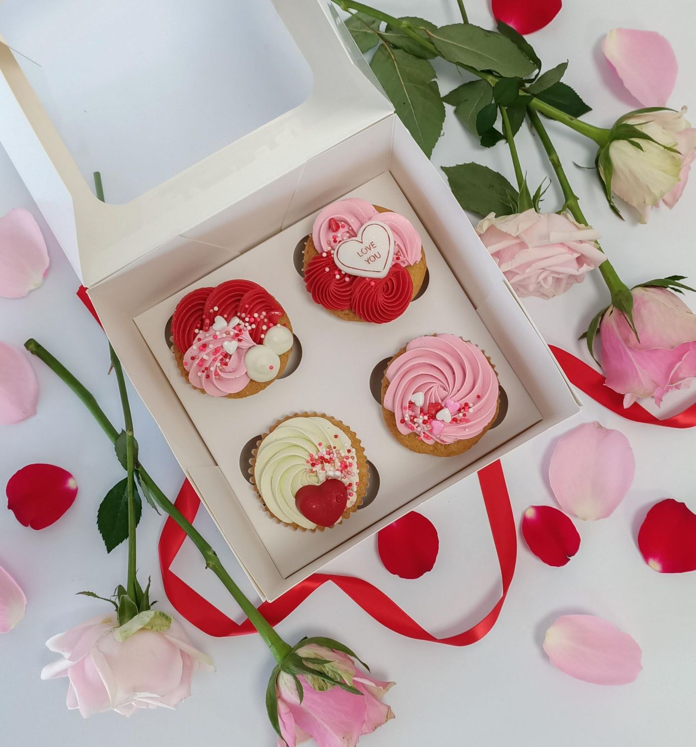 4 pack of Valentine's Day cupcakes with pink and red buttercream, hearts and sprinkles. Gold Coast, Online