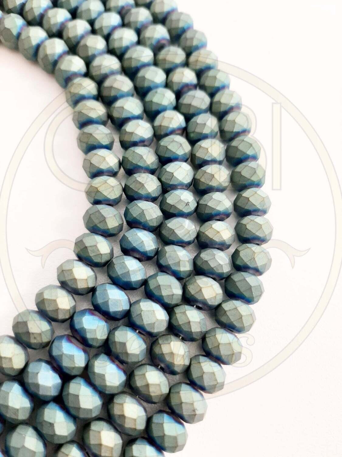 Stiklo kristalai, briaunuoti, matiniai, rondelės forma, žalios, melsvos spalvos, 4x3mm 45cm juosta