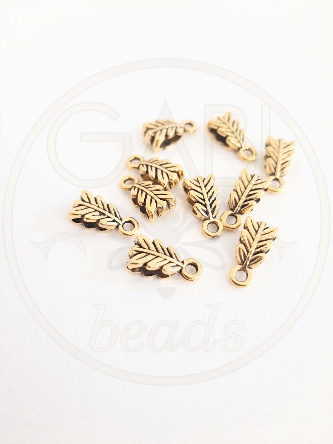 Intarpai,  aukso spalvos, 6x13mm, 17vnt