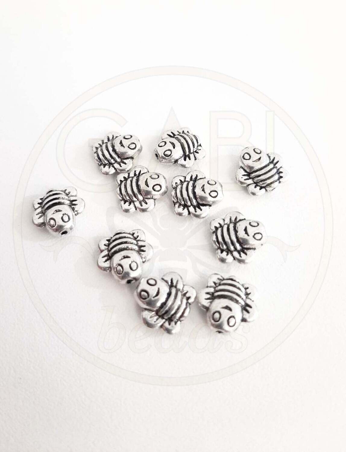 Intarpai, plieno spalvos, 9x8,5mm, 10vnt
