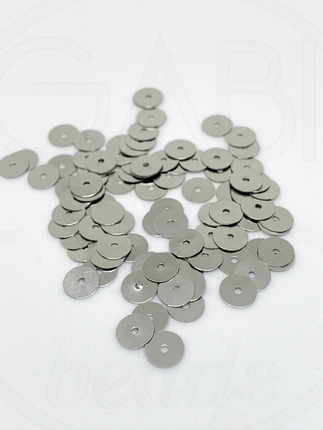 Nerūdijančio plieno intarpai, plieno spalvos, 6x0,3mm, 100vnt