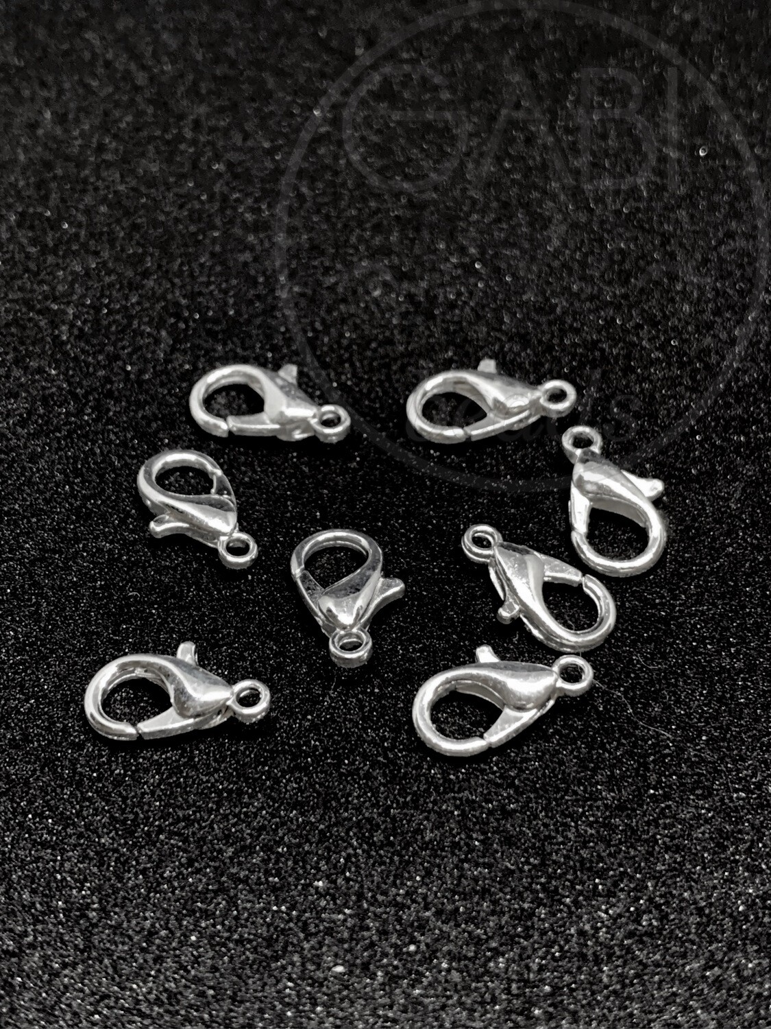 Užsegimai, sidabro spalvos, 12x6mm , 25vnt