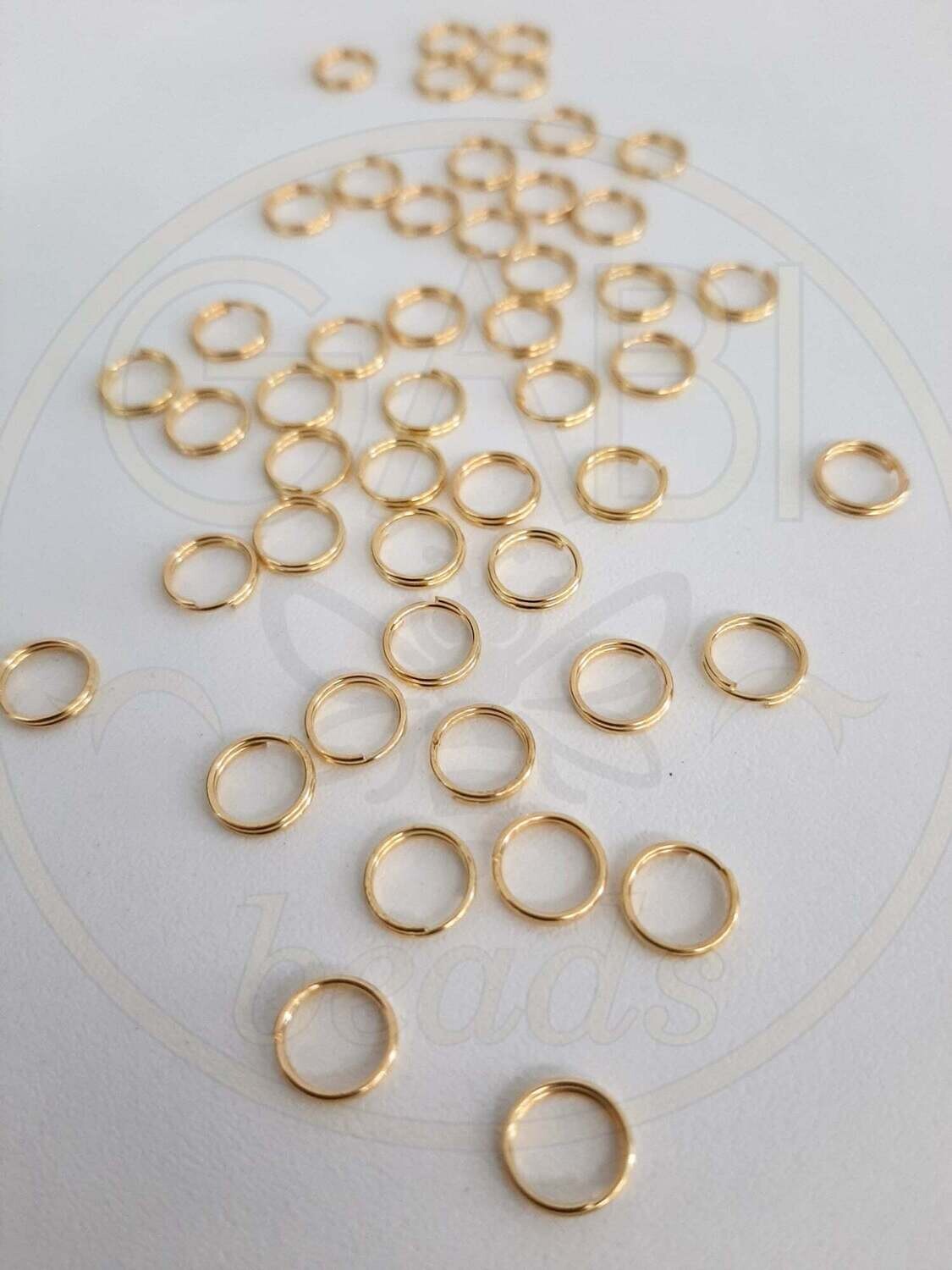 Žiedeliai, dvigubi, aukso spalvos 7mm skersmens, 10g