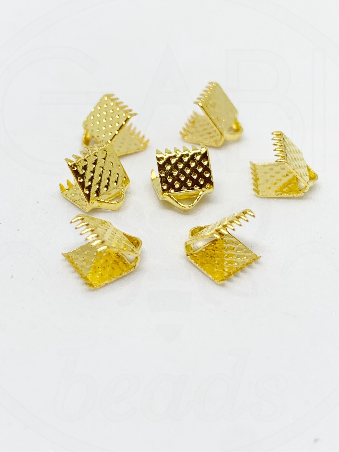 Užbaigimo detalė juostelei, aukso spalvos, 6x8mm, 25vnt