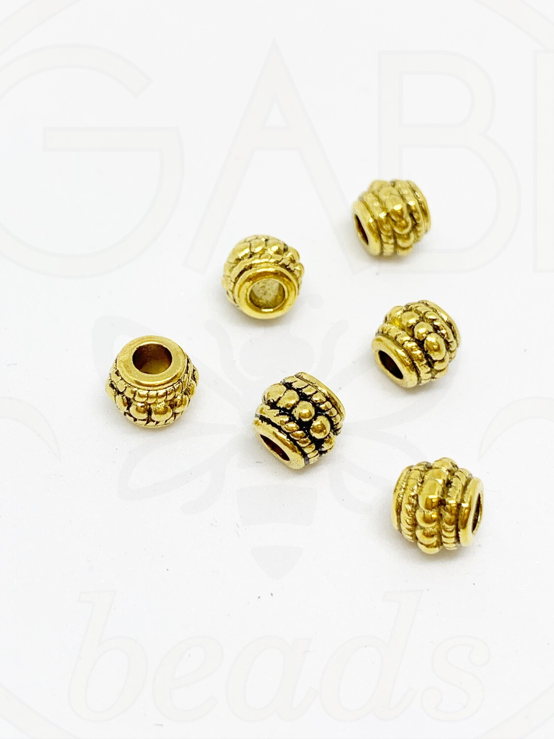 Intarpai,  aukso spalvos, 6x8mm, 12vnt