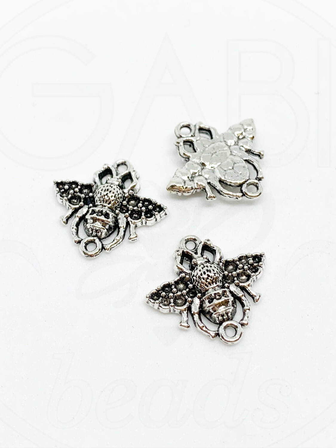 Pakabukas su akutėmis, sidabro spalvos 18x19x4mm, 3vnt
