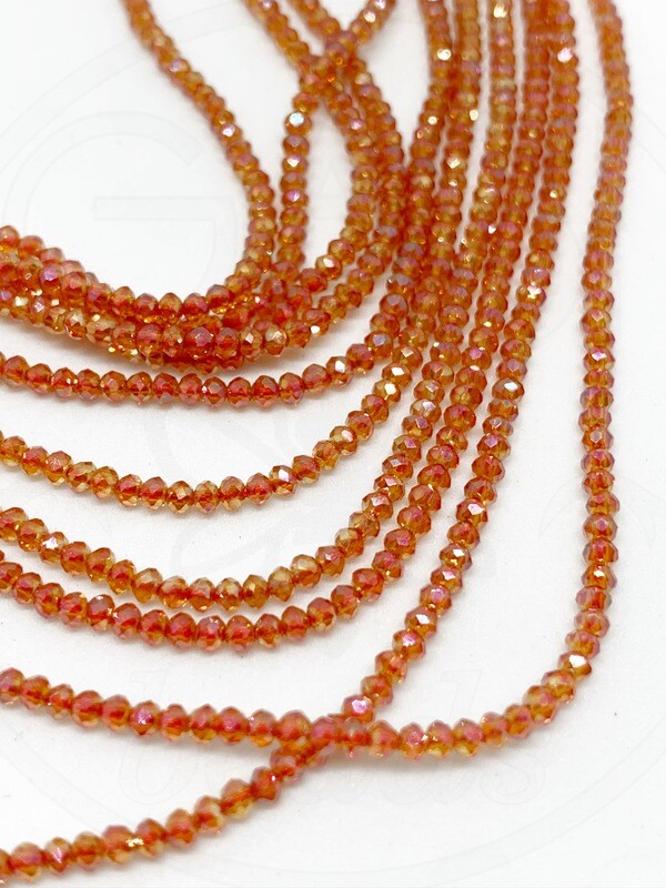 Stiklo kristalai, briaunuoti, rondelės forma, oranžinės spalvos su AB danga, 2x1mm 36cm juosta