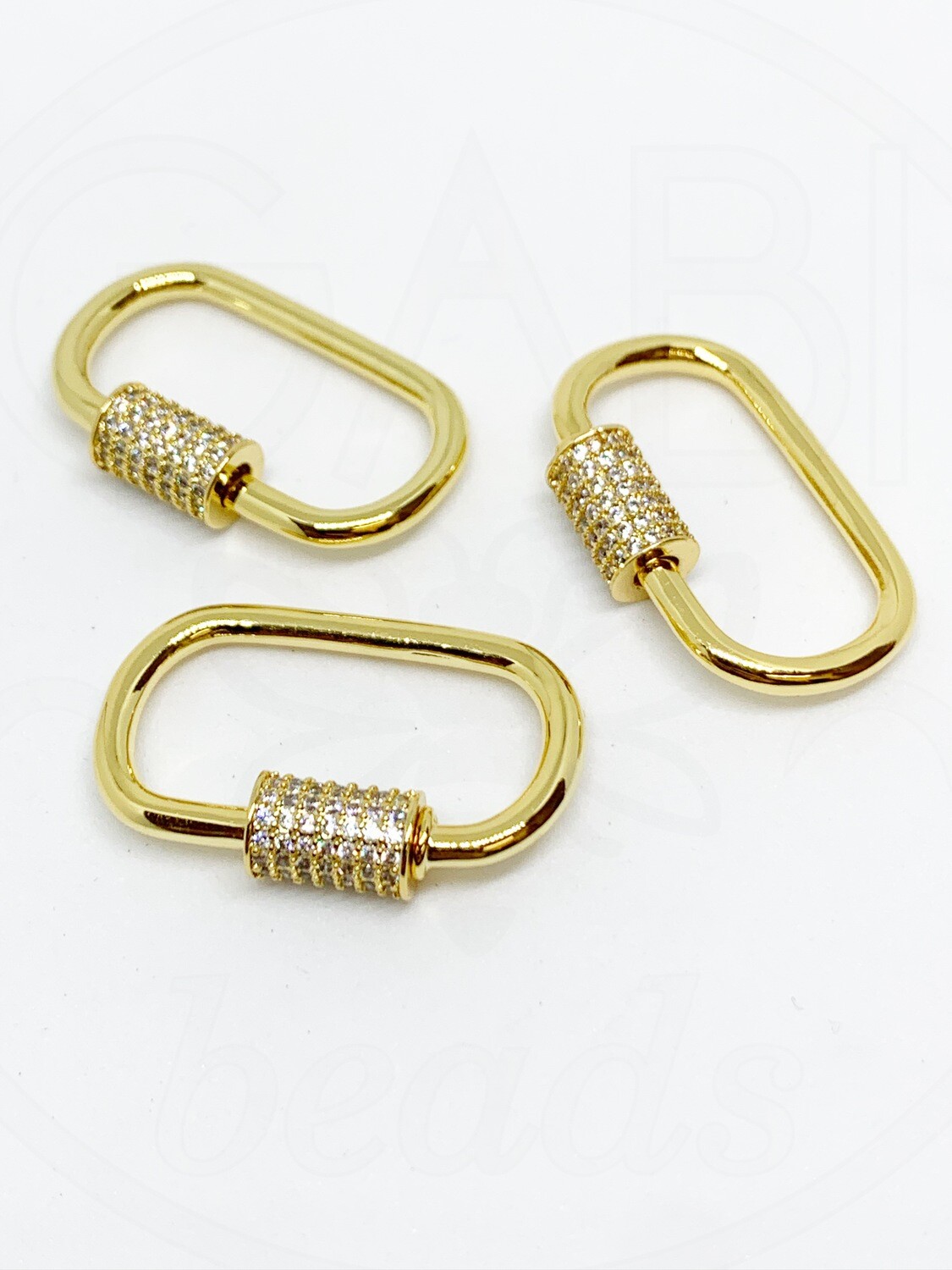 Nerūdijančio plieno užsegimai su cirkonio akutėmis, aukso spalvos 26,5x17mm, 1 vnt