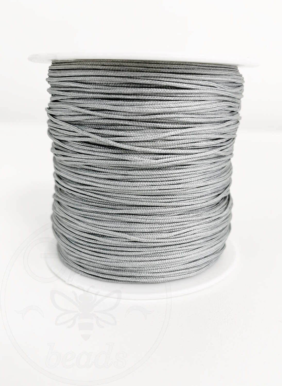 Nailoninis siūlas, 0,8mm, pilkos spalvos, 100m ritė.