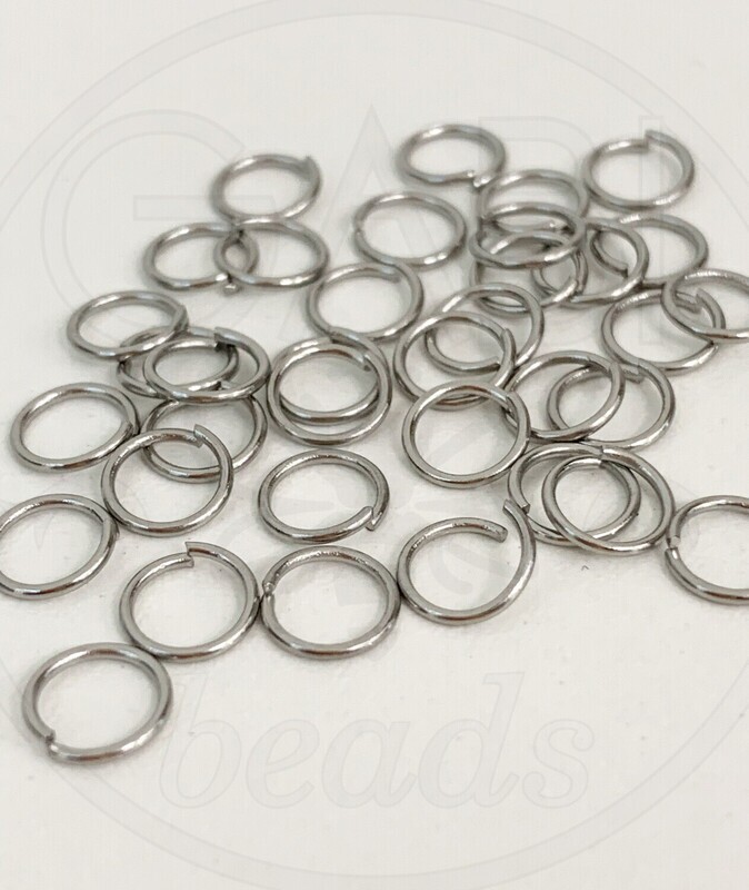 Nerūdijančio plieno žiedeliai, plieno spalvos 5x0,8mm, 50 vnt