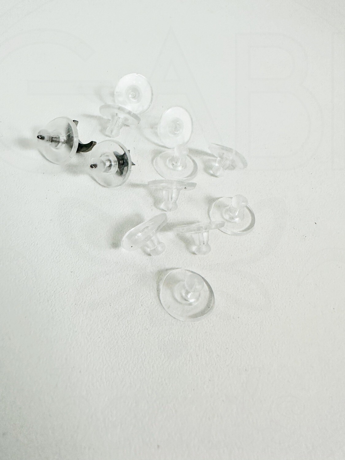 Silikoniniai auskarų užsegimai, skaidrios spalvos, 6x10mm, 50vnt