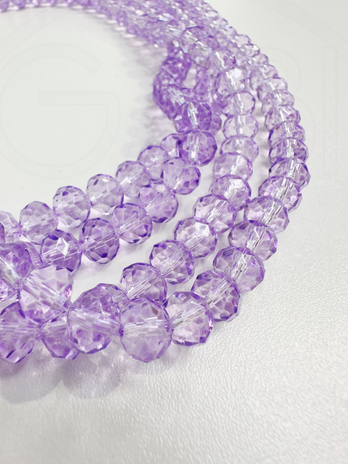 Stiklo kristalai, briaunuoti, rondelės forma, violetinės spalvos
