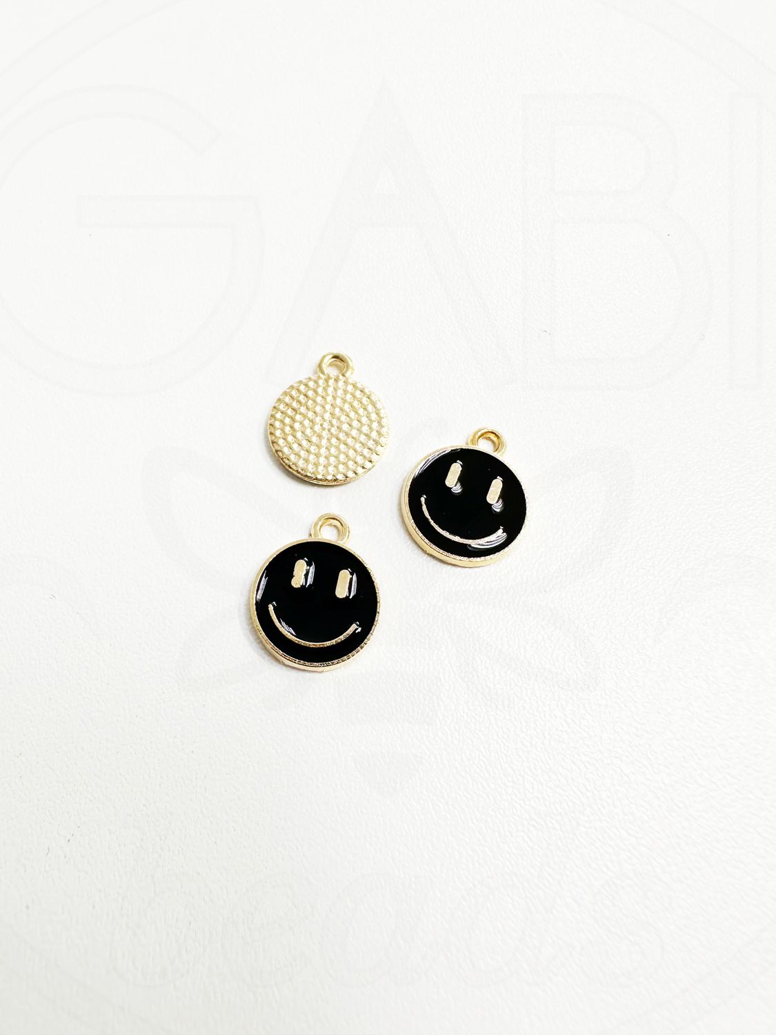 Pakabukas SMILE dengtas emale, aukso, juodos spalvos 14,5x12x1,50mm, 4vnt