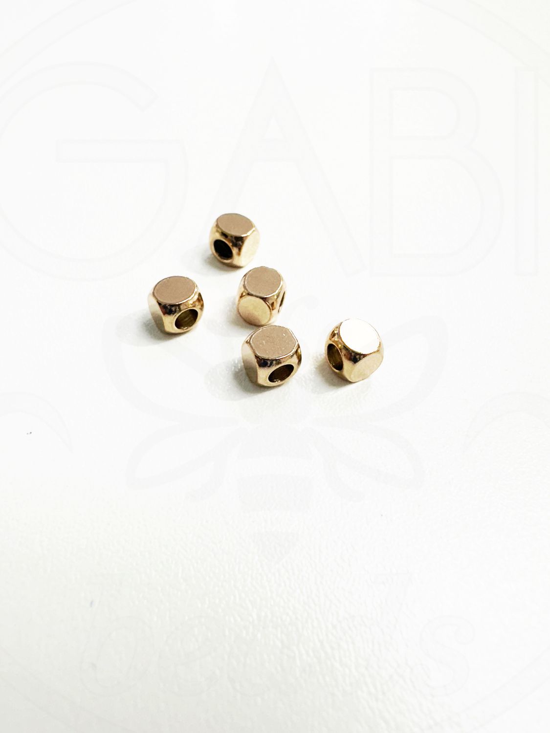 Nerūdijančio plieno intarpai, rose gold spalvos, 5x5mm, 2vnt