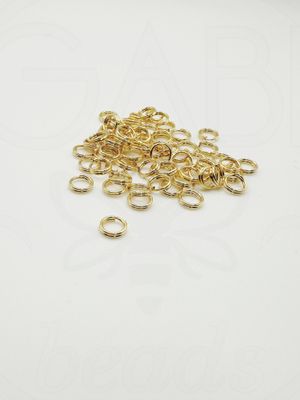 Dvigubi nerūdijančio plieno žiedeliai, aukso spalvos 6x1mm, 15vnt
