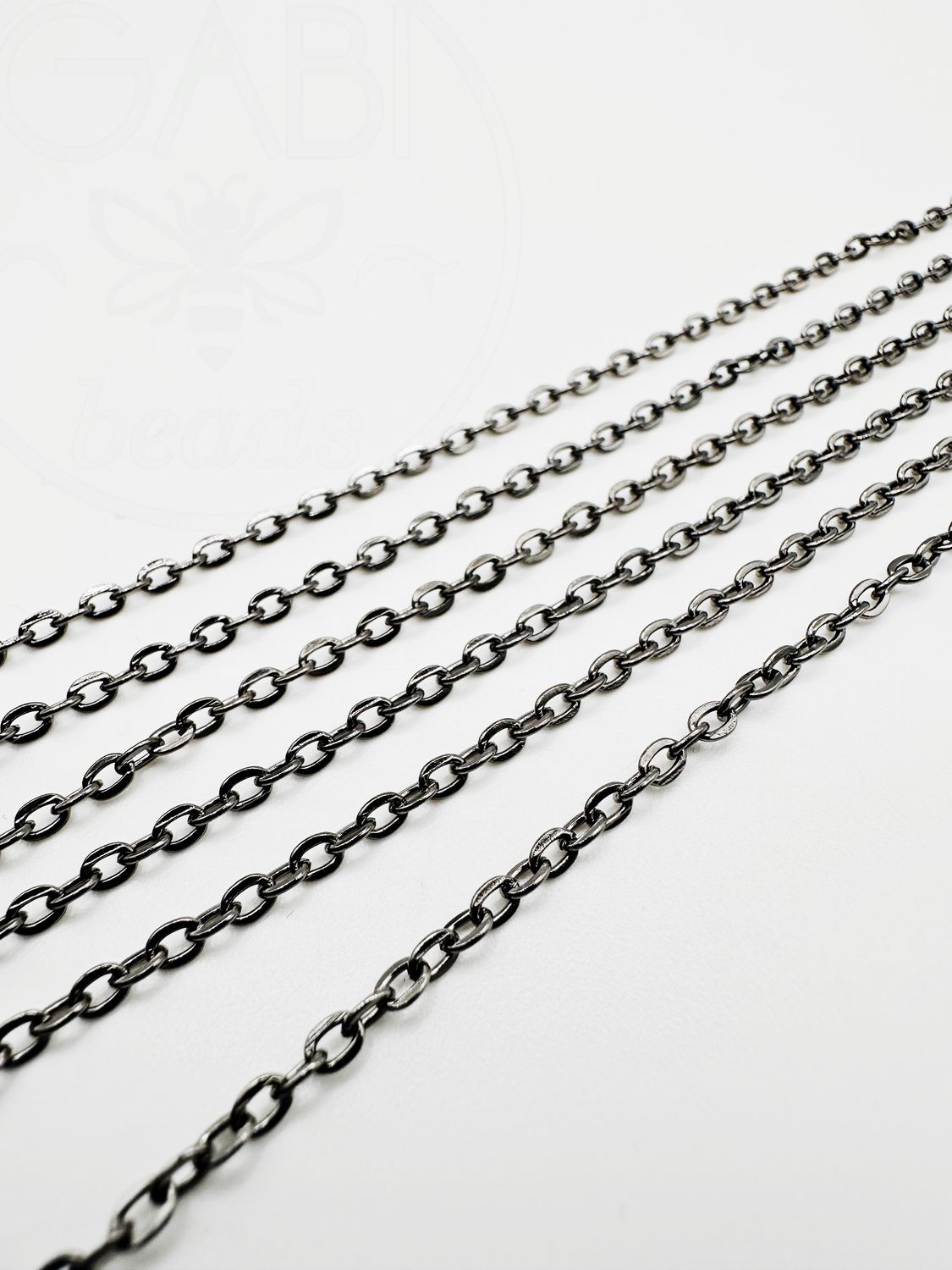 Geležinė grandinėlė, 3x2.2x0.6mm,  tamsinto metalo spalvos, 10cm