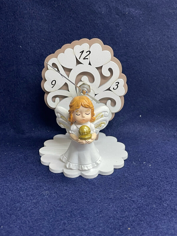 Orologio albero bimba ostia