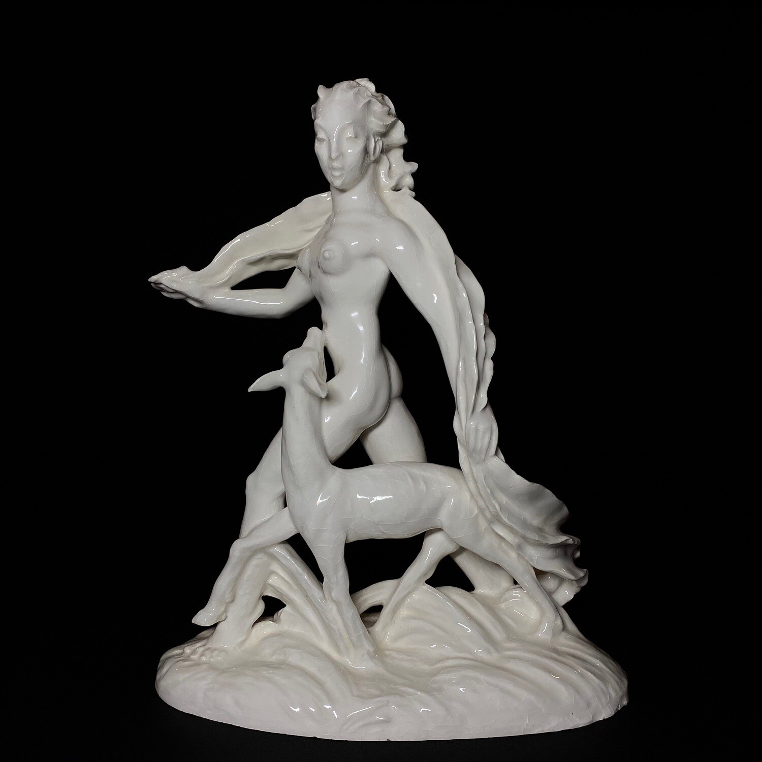 Czechoslovakian Art Deco Ceramic Statue of a Female Figure With a Doe Designed by Rudolf Hlavica in 1941