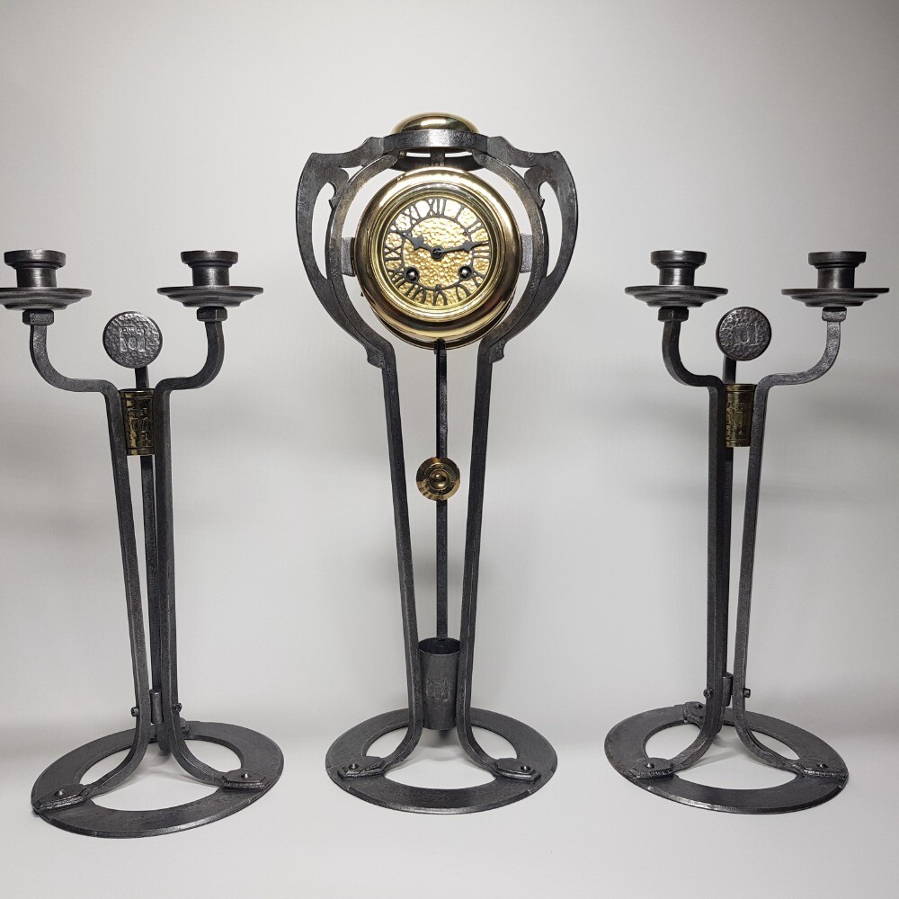 Arts And Crafts Working Metal Clock With Two Side Pieces