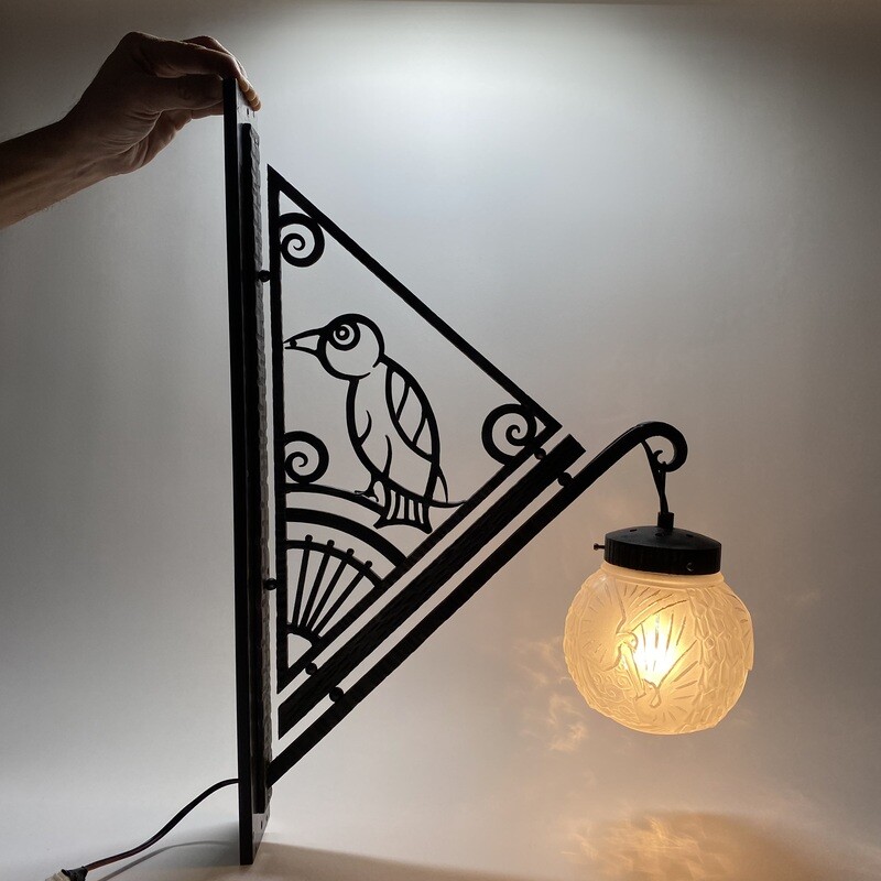 Pair Of French Art Deco Wall Lamps With A Stylized Bird Made by Muller Freres Luneville