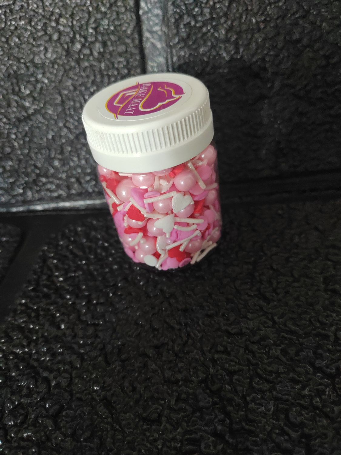 Assorted pink sprinkles 40g
