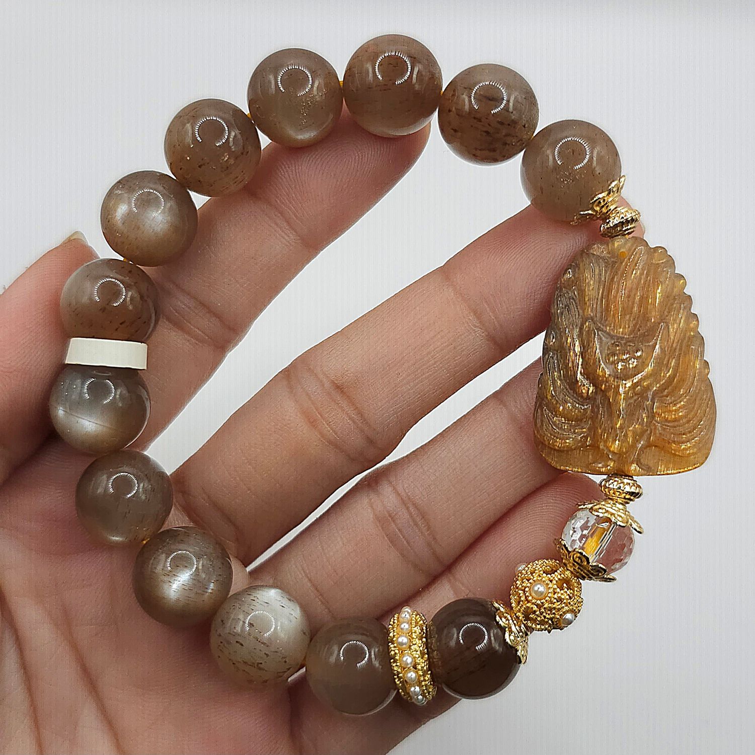 Natural Golden Backbone Sunstone with 9 Tail Fox