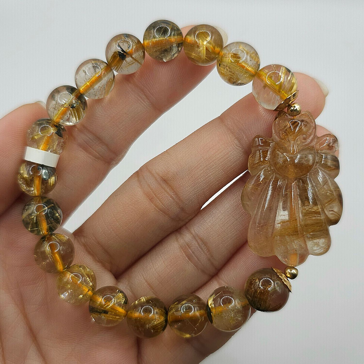 Natural Titanium Golden Ruti with 9 Tail Fox