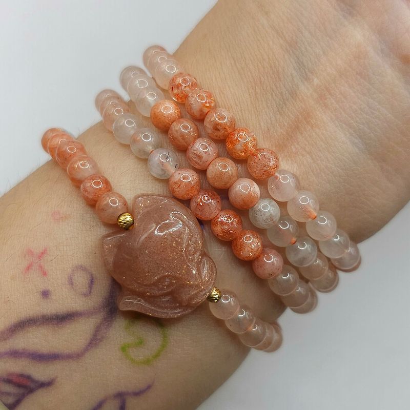 Natural 3 Lap Sunstone with 9 Tail Fox - 18K