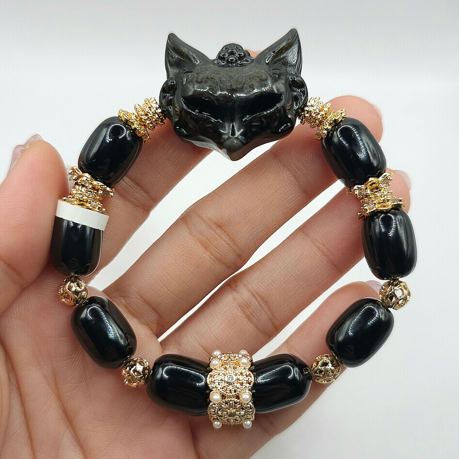 Natural Black Onyx with 9 Tail Fox