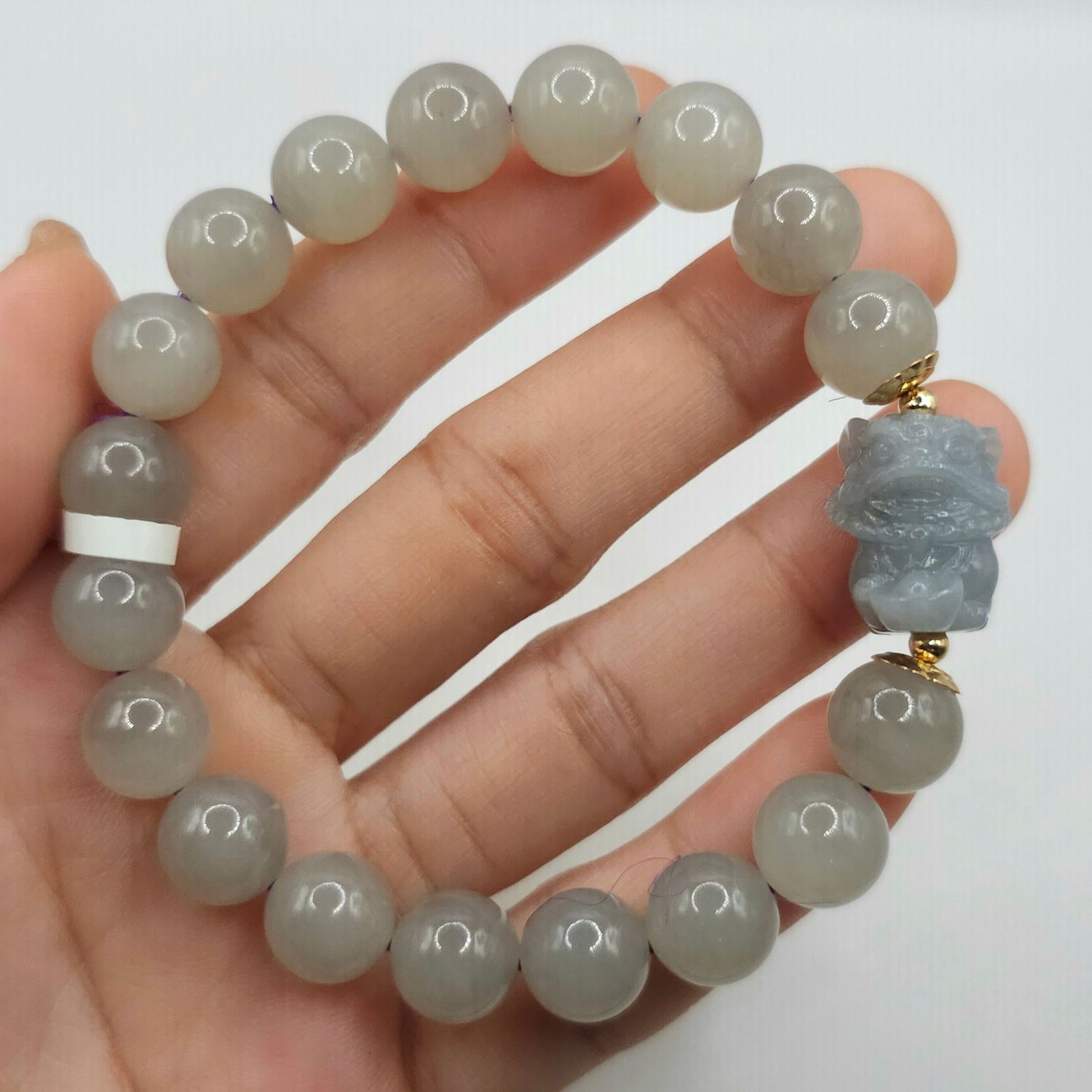 Natural Purple Jade with Dancing Lion