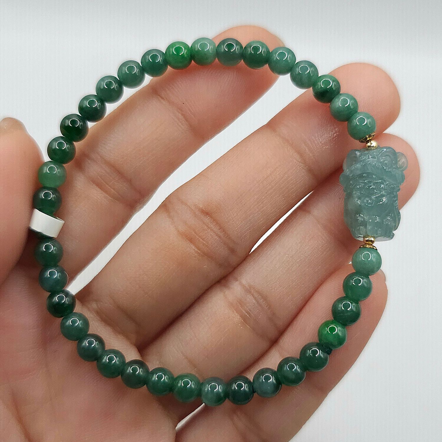 Natural Blue Water Jade with Dancing Lion