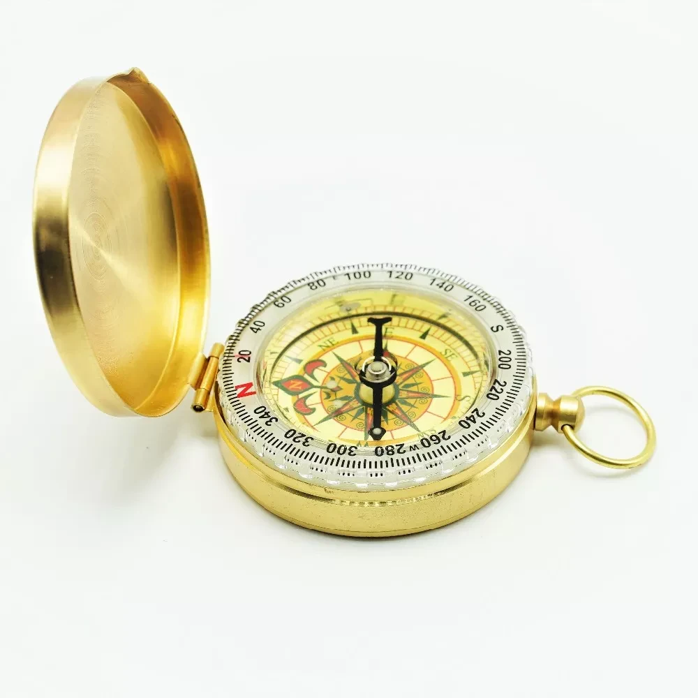 Metal compass with luminescent ring