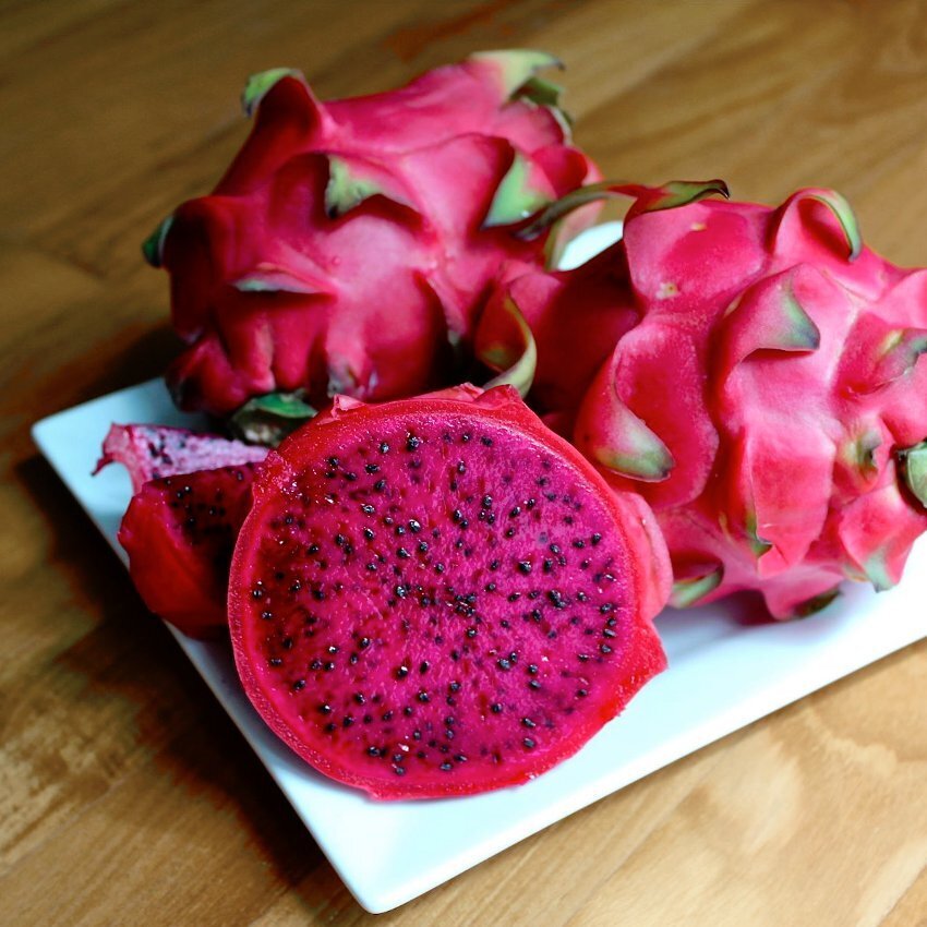 This is Hylocereus costaricensis. The common name for this is Red Dragon Fruit. Whimsy and Wonder Seeds sells the freshest of rare fruit seeds. Other Common names for this exotic fruit species are: Red Dragon Fruit - Hylocereus undatus, Pitaya, Dragon Fruit. Check this Red Dragon Fruit (Hylocereus costaricensis) out along with all of our other Rare  and Exotic Fruit plant seeds here at Whimsy and Wonder Seeds. We ship these exotic fruit plants seeds  from Canada to anywhere in the World.