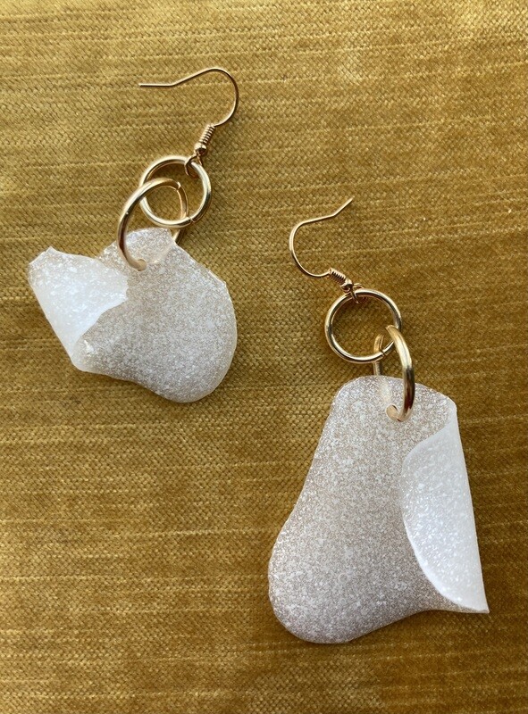 Experimental milk puddle earring