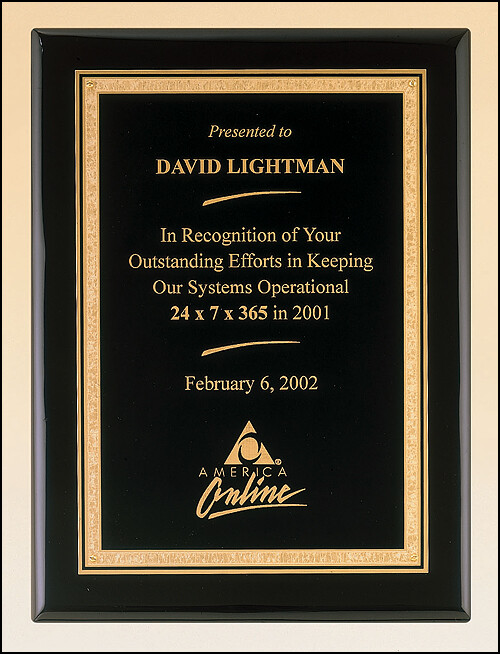Black stained piano finish plaque with a black textured center plate and florentine border